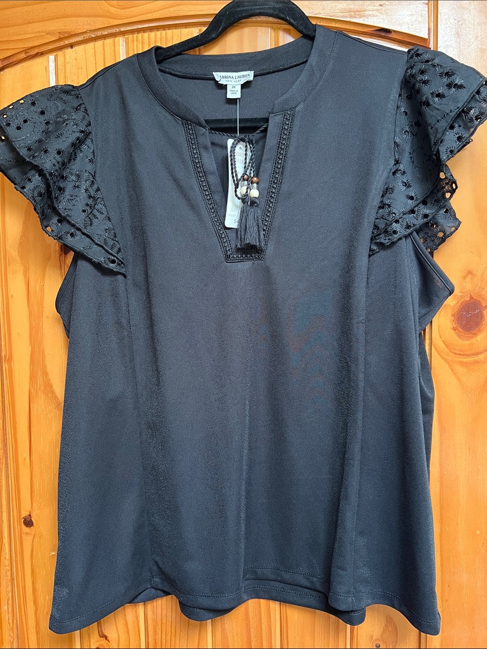 Sabrina Lauren Black Eyelet Flutter Sleeve Blouse with Tassel Tie